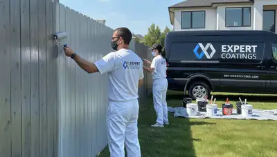 Fence painting service in Tacoma, WA for durable wood protection against rain and coastal moisture